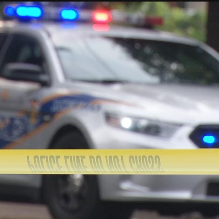 LMPD CAR WITH LIGHTS AND CRIME SCENE TAPE